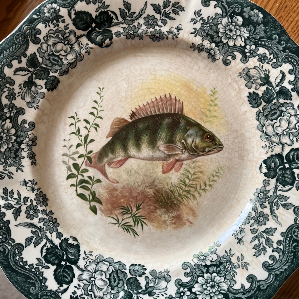 Photo of a Palissy Game Series plate featuring a perch.